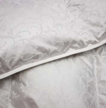 Пуховое одеяло: плюсы и минусы