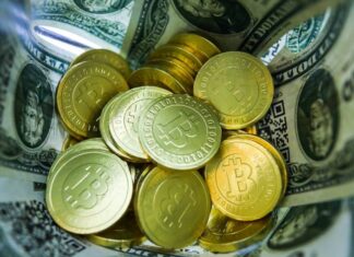 Стоимость биткойна впервые превысила $58 тыс.