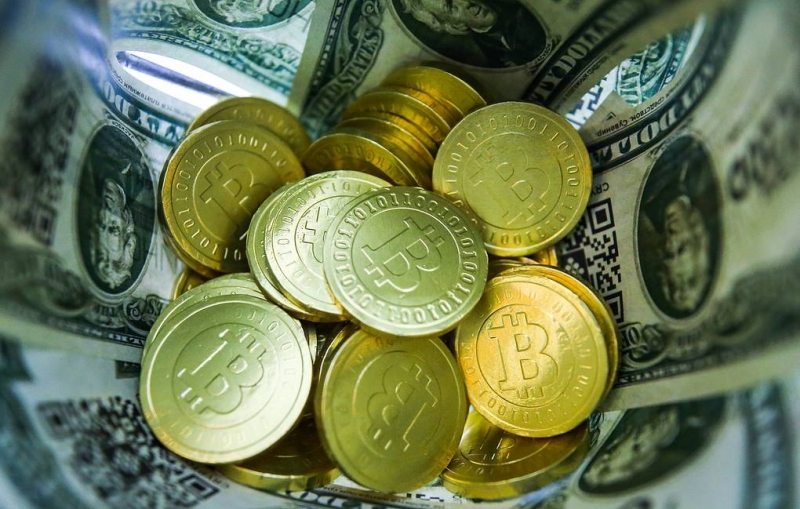 Стоимость биткойна впервые превысила $58 тыс.